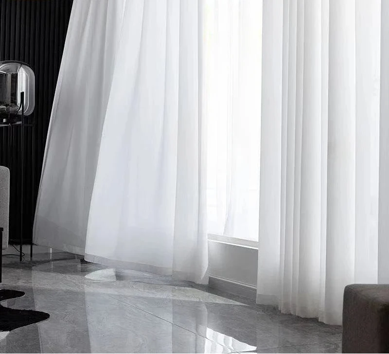 Rideaux pour baie vitrée : comment choisir les rideaux parfaits pour habiller une grande ouverture ?